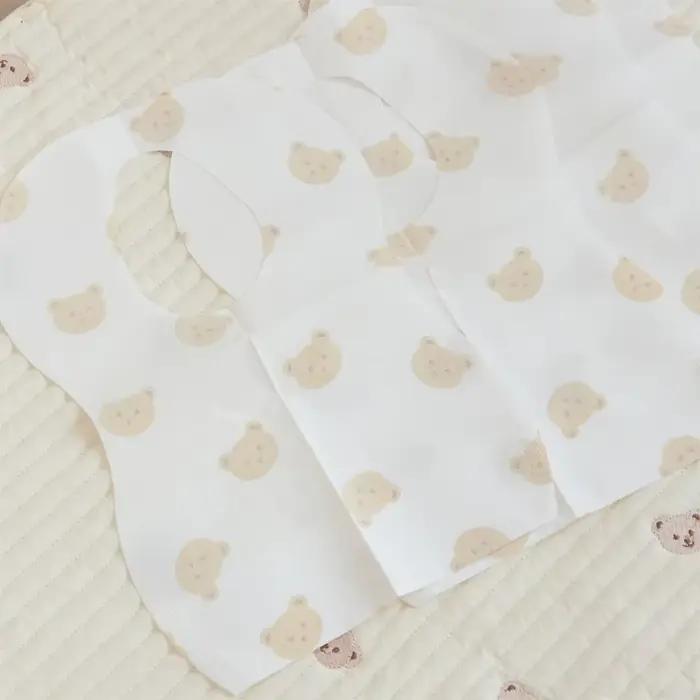 Paquet de 50 bavoirs jetables pour bébés âgés de 6 mois à 2 ans, bavoir d'alimentation ours de dessi