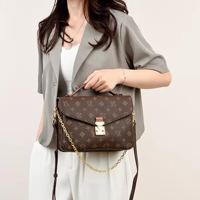 Sac à langer vintage de luxe en cuir haut de gamme, design classique de créateur, style décontracté 