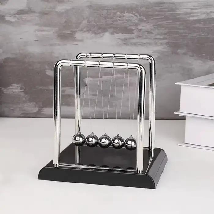 Boules d'équilibre au pendule Newton : décoration de bureau élégante et jouet dynamique éducatif