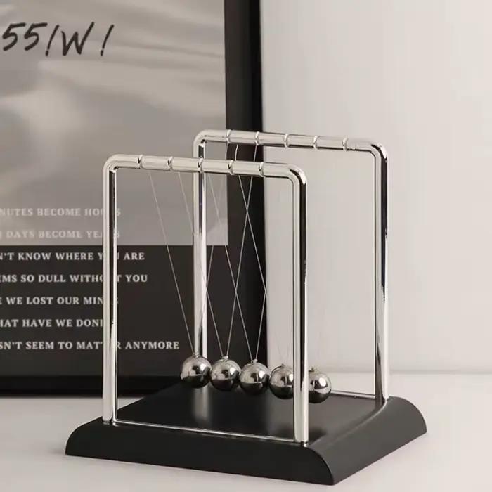 Boules d'équilibre au pendule Newton : décoration de bureau élégante et jouet dynamique éducatif