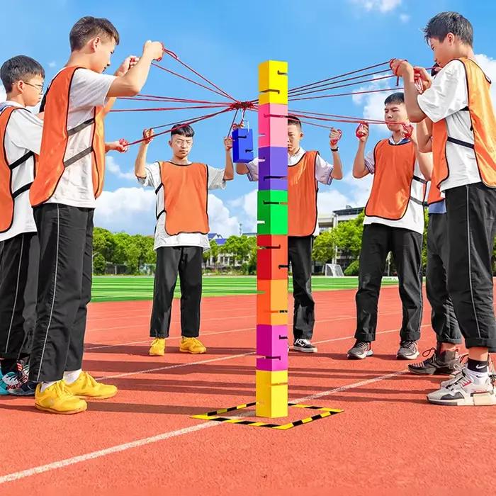 Tour de construction avec équipes d'entraînement en expansion