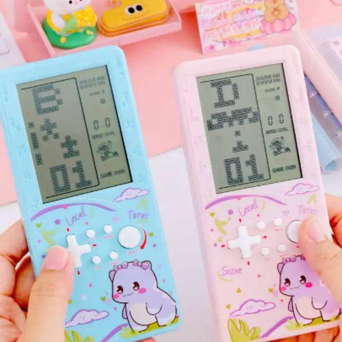 Console de jeu portable dinosaure de dessin animé mignon