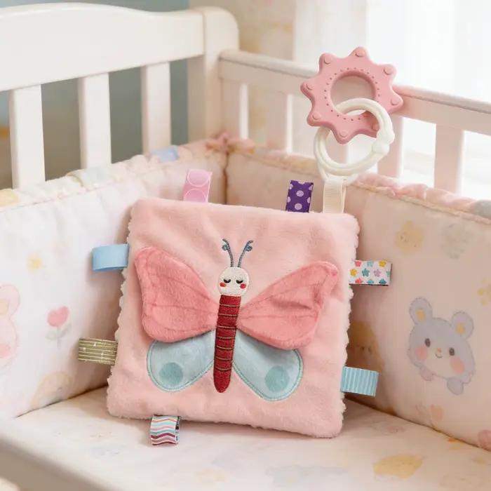 Couverture sensorielle pour bébé avec hochet