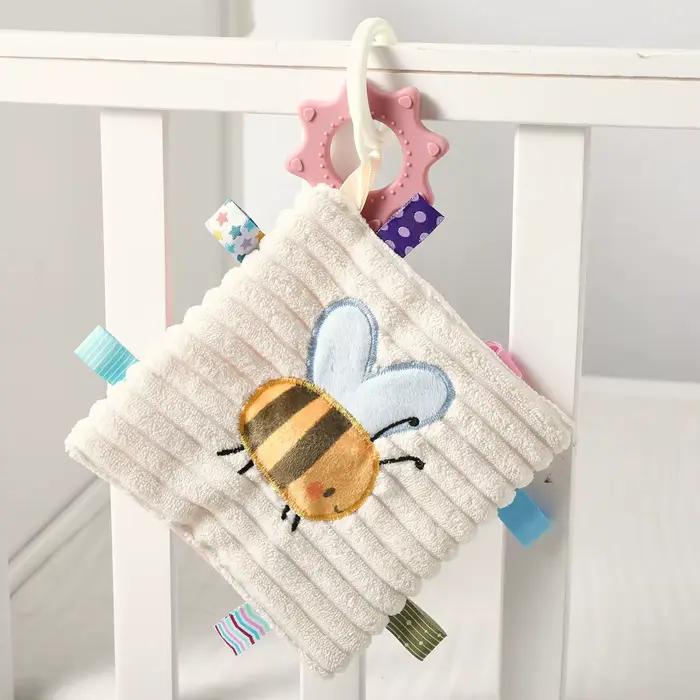 Couverture sensorielle pour bébé avec hochet