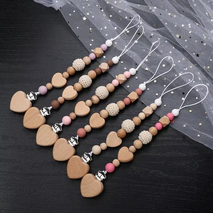 Nouveau coeur bébé Anti-chute chaîne sucette Clips perles de Silicone infantile mamelon apaiser