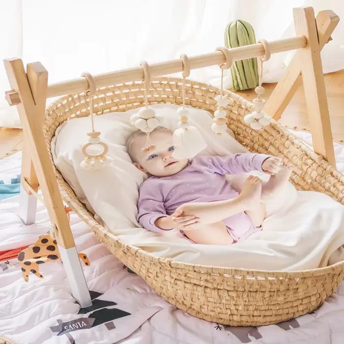 Portique d'activités en bois pliable avec jouets sensoriels suspendus pour bébé 0-12 mois