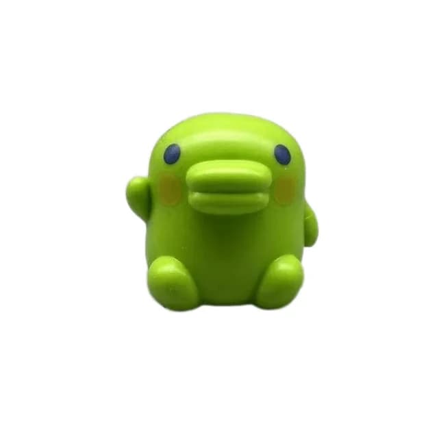 Figurine Tamagotchi en position assise, thème personnage Tamagotchi, objet de collection
