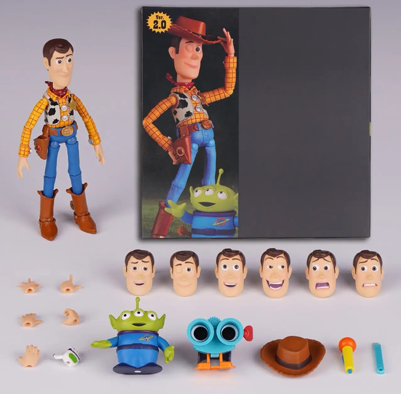 Figurine articulée Woody de Toy Story Version 2 avec tête remplaçable, mains interchangeables, acces