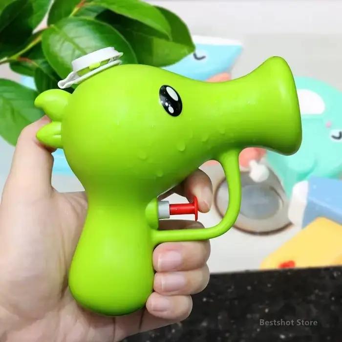 Pistolet à eau dessin animé en forme de pois pour enfants, jouet d'été d'extérieur, lanceur de jet d