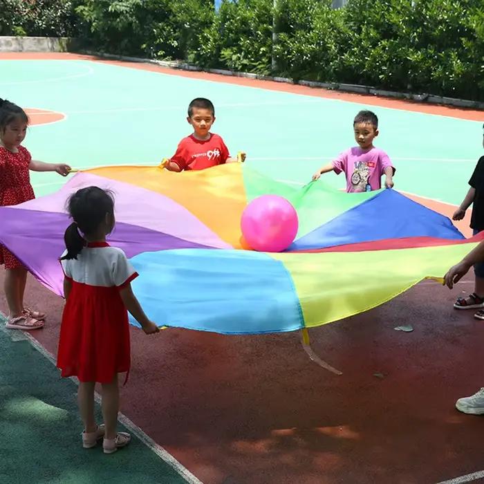 Parachute arc-en-ciel pour enfants, jeux de plein air, jouet pour enfants, 2m, 3m, 5m, travail d'équipe coopératif, fête, carnaval, faveurs amusantes