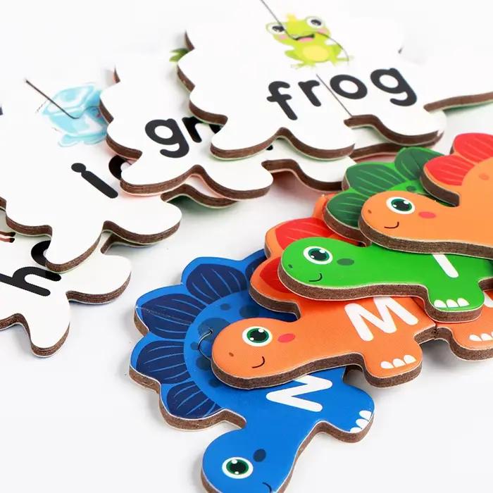 Jeu de puzzle d'association de dinosaures en bois avec cartes de lettres ABC