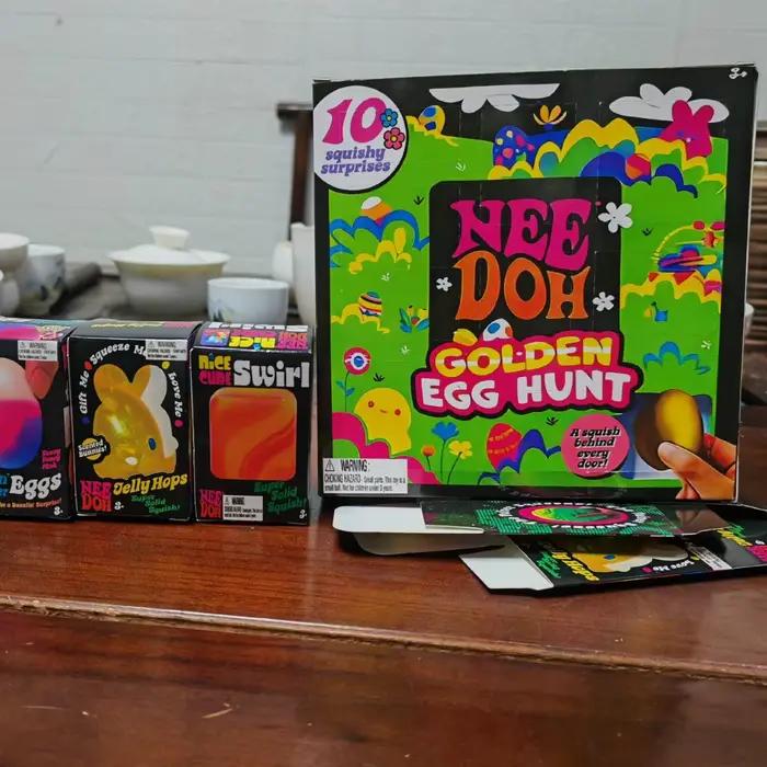 Nouveau Jouet Chasse au Trésor Nee-doh Œuf Doré avec Surprise Moelleuse Anti-stress à Presser pour Enfants, Idéal pour Fête de Pâques
