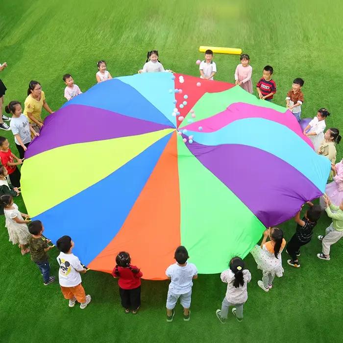 Parachute arc-en-ciel pour enfants, jeux de plein air, jouet pour enfants, 2m, 3m, 5m, travail d'équipe coopératif, fête, carnaval, faveurs amusantes