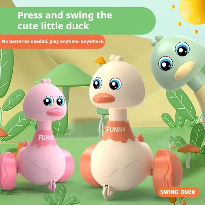 Jouet pour bébé, canard pivotant de dessin animé