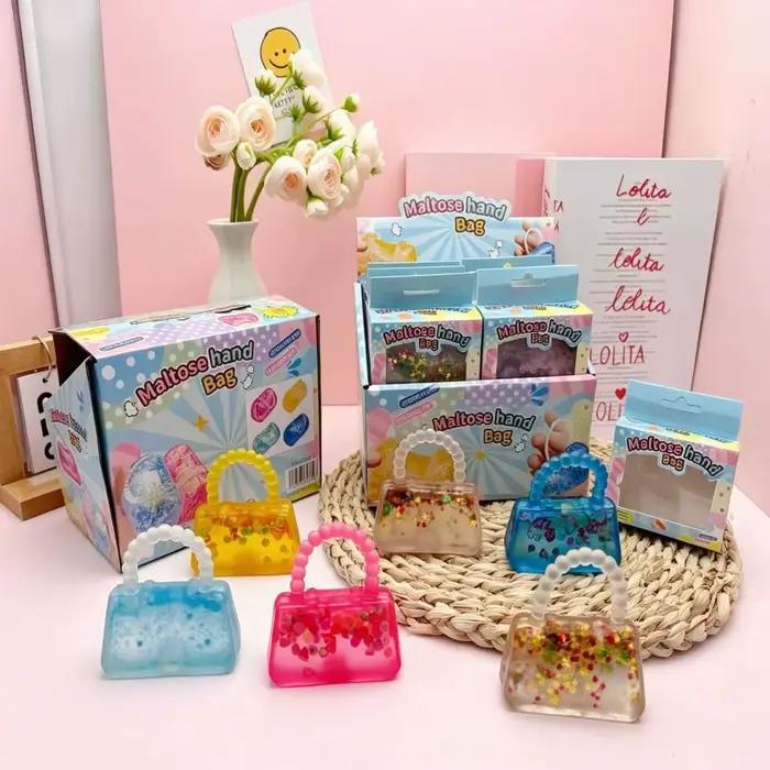 Mini sac à main jouet sensoriel anti-stress en forme de sac à main, souple et extensible, avec rembourrage transparent effet gelée et paillettes