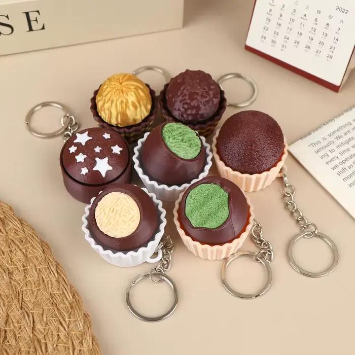 Nouveau ! Populaire ! Porte-clés clavier en chocolat simulé, jouet sensoriel anti-stress à presser, clicker de clavier 3D en chocolat