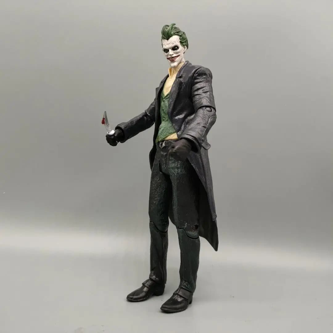 DCC Collectibles Ark-ham Origins The Joke-Man avec couteau Figurine d'action 7"