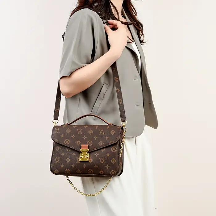 Sac à langer vintage de luxe en cuir haut de gamme, design classique de créateur, style décontracté