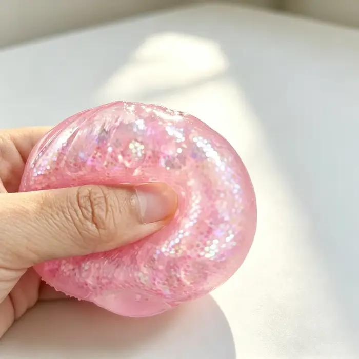 Jouet anti-stress en forme de bao bao vapeur avec perles et paillettes