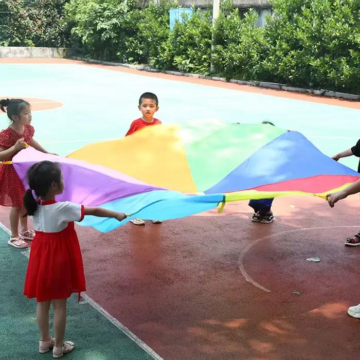 Parachute arc-en-ciel pour enfants, jeux de plein air, jouet pour enfants, 2m, 3m, 5m, travail d'équipe coopératif, fête, carnaval, faveurs amusantes