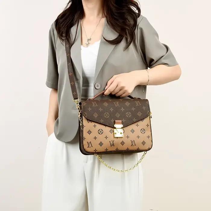 Sac à langer vintage de luxe en cuir haut de gamme, design classique de créateur, style décontracté