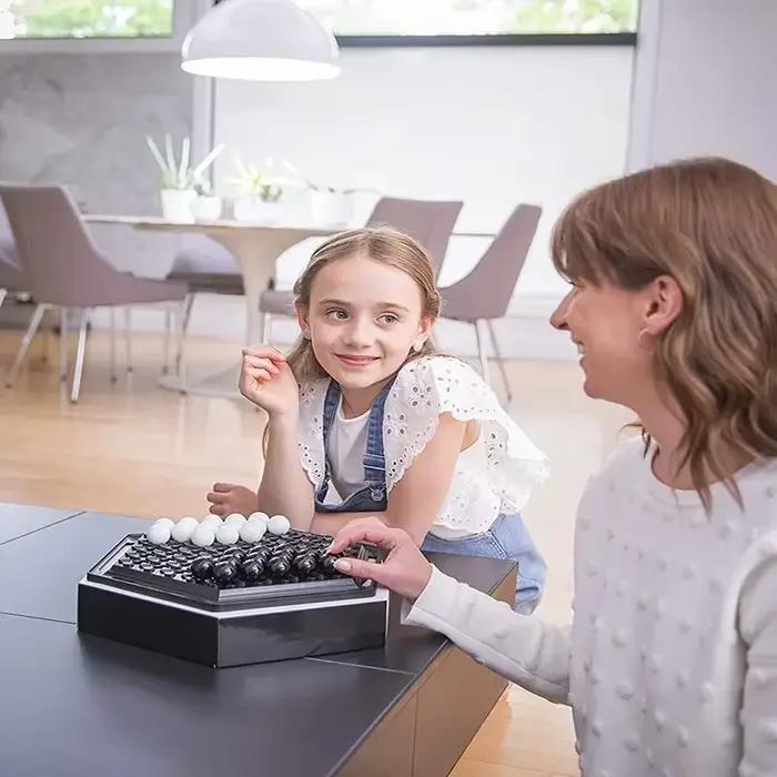 Capable Games Jeu d'échecs portable Jeu de société familial pour enfants Développement intellectuel Carrom Board Push Chess