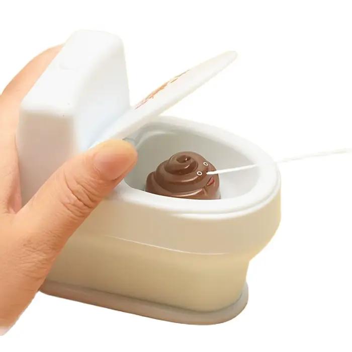 1PC-nouveau intéressant merde Spray farce jouet blague culinaire jouets Mini arroseur toilette pistolet Simulation