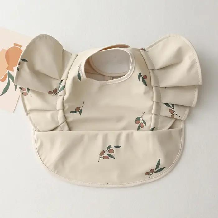 Nordique bavoirs bébé imperméable à manches courtes avec poche alimentation bavoir