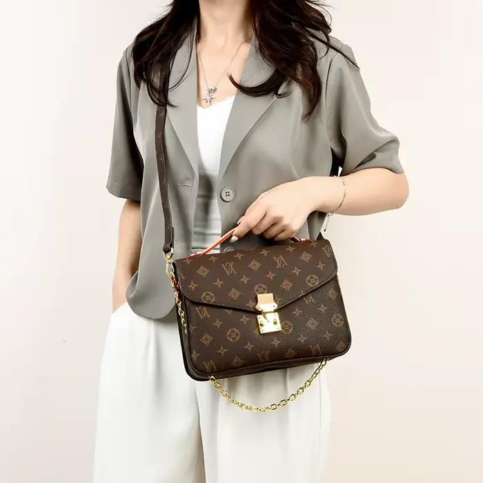 Sac à langer vintage de luxe en cuir haut de gamme, design classique de créateur, style décontracté