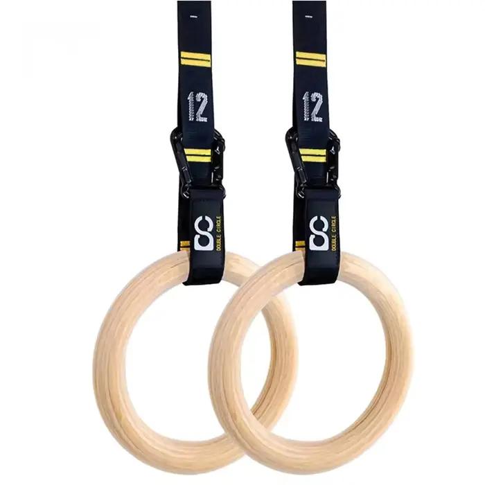 Anneaux de gymnastique en bois de 32 mm avec sangles numérotées à réglage rapide pour un contrôle am