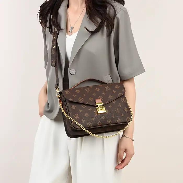 Sac à langer vintage de luxe en cuir haut de gamme, design classique de créateur, style décontracté