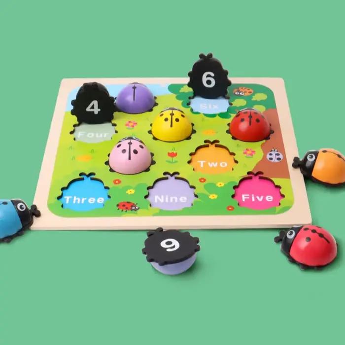 Jeu de comptage avec bâtonnets en forme de coccinelle